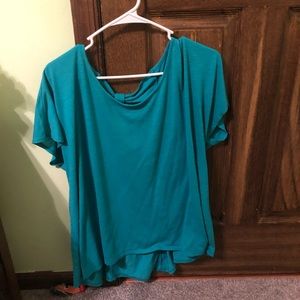 Teal blouse, bow cutout in back
